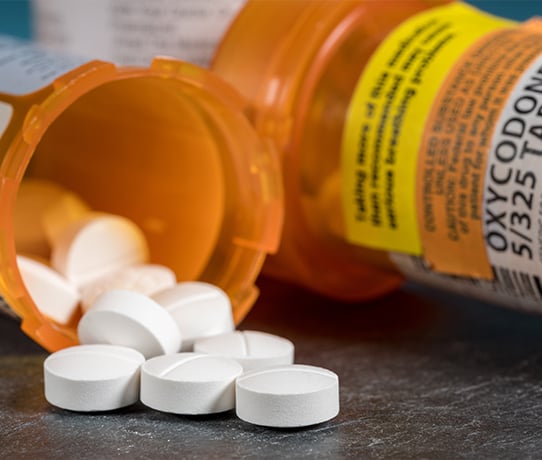 Open bottles of prescription opioids including oxycodone